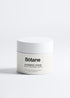 Botane face and body scrub jar on a white background